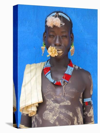 Tsemay Man with Flower in Mouth at Weekly Market, Key Afir, Lower Omo Valley, Ethiopia, Africa-Jane Sweeney-Stretched Canvas