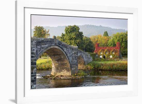 Tu Hwnt I'R Bont Tearoom and Pont Fawr (Big Bridge) in Autumn, Llanrwst, Snowdonia, Conwy, Wales-Stuart Black-Framed Photographic Print