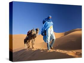 Tuareg Man Leading Camel Train, Erg Chebbi, Sahara Desert, Morocco-Peter Adams-Stretched Canvas