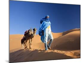 Tuareg Man Leading Camel Train, Erg Chebbi, Sahara Desert, Morocco-Peter Adams-Mounted Photographic Print