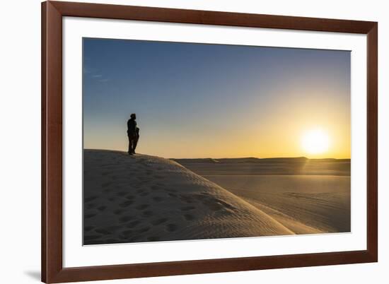 Tuareg standing on a sand dune in the Tenere Desert at sunrise, Sahara, Niger, Africa-Michael Runkel-Framed Photographic Print