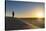 Tuareg standing on a sand dune in the Tenere Desert at sunrise, Sahara, Niger, Africa-Michael Runkel-Stretched Canvas