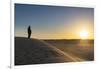 Tuareg standing on a sand dune in the Tenere Desert at sunrise, Sahara, Niger, Africa-Michael Runkel-Framed Photographic Print