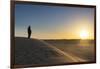 Tuareg standing on a sand dune in the Tenere Desert at sunrise, Sahara, Niger, Africa-Michael Runkel-Framed Photographic Print