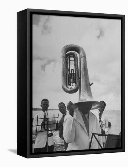 Tuba Player Keeping His Head Dry in a Rainstorm During Visit to St. Croix by Pres. Harry S. Truman-Thomas D^ Mcavoy-Framed Stretched Canvas