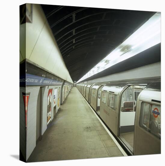 Tube Train Standing at Blackhorse Road Station on the Victoria Line, London, 1974-Michael Walters-Stretched Canvas