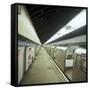 Tube Train Standing at Blackhorse Road Station on the Victoria Line, London, 1974-Michael Walters-Framed Stretched Canvas