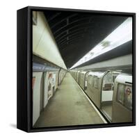 Tube Train Standing at Blackhorse Road Station on the Victoria Line, London, 1974-Michael Walters-Framed Stretched Canvas