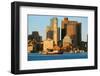 Tugboat with Boston Harbor and the Boston skyline at sunrise as seen from South Boston, Massachu...-null-Framed Photographic Print