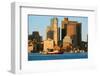 Tugboat with Boston Harbor and the Boston skyline at sunrise as seen from South Boston, Massachu...-null-Framed Photographic Print