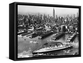 Tugboats Aid Ocean SS Queen Mary While Docking at 51st Street Pier with NYC Skyline in Background-null-Framed Stretched Canvas