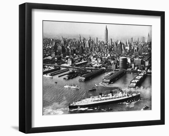 Tugboats Aid Ocean SS Queen Mary While Docking at 51st Street Pier with NYC Skyline in Background-null-Framed Photographic Print