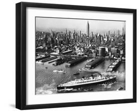 Tugboats Aid Ocean SS Queen Mary While Docking at 51st Street Pier with NYC Skyline in Background-null-Framed Photographic Print