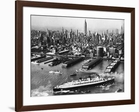 Tugboats Aid Ocean SS Queen Mary While Docking at 51st Street Pier with NYC Skyline in Background-null-Framed Photographic Print