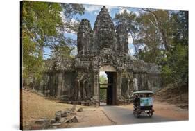 Tuk Tuk Going Through Victory Gate, Angkor Thom, Angkor World Heritage Site, Siem Reap, Cambodia-David Wall-Stretched Canvas