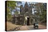 Tuk Tuk Going Through Victory Gate, Angkor Thom, Angkor World Heritage Site, Siem Reap, Cambodia-David Wall-Stretched Canvas