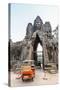 Tuk-Tuks Driving Through the South Gate at Angkor Thom-Michael Nolan-Stretched Canvas