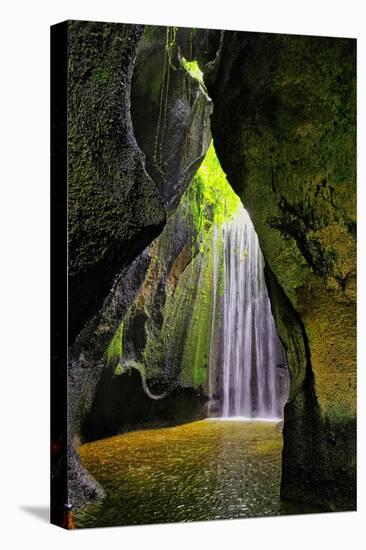 Tukad Cepung Waterfall in the central mountains of Bali, Indonesia.-Greg Johnston-Stretched Canvas