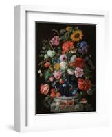 Tulips, a sunflower, an iris and numerous other flowers in a glass vase on marble column base-Jan Davidsz. de Heem-Framed Giclee Print