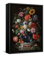 Tulips, a sunflower, an iris and numerous other flowers in a glass vase on marble column base-Jan Davidsz. de Heem-Framed Stretched Canvas