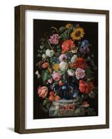 Tulips, a sunflower, an iris and numerous other flowers in a glass vase on marble column base-Jan Davidsz. de Heem-Framed Giclee Print