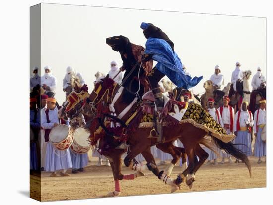 Tunisian Bedouins Demonstrate Their Riding Skills During the 36th Sahara Festival of Douz-null-Stretched Canvas