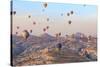 Turkey, Anatolia, Cappadocia, Goreme. Hot air balloons above Red Valley.-Emily Wilson-Stretched Canvas