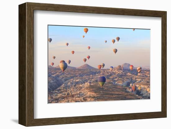 Turkey, Anatolia, Cappadocia, Goreme. Hot air balloons above Red Valley.-Emily Wilson-Framed Photographic Print