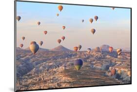 Turkey, Anatolia, Cappadocia, Goreme. Hot air balloons above Red Valley.-Emily Wilson-Mounted Photographic Print