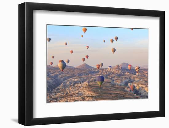 Turkey, Anatolia, Cappadocia, Goreme. Hot air balloons above Red Valley.-Emily Wilson-Framed Premium Photographic Print