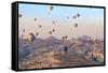 Turkey, Anatolia, Cappadocia, Goreme. Hot air balloons above Red Valley.-Emily Wilson-Framed Stretched Canvas