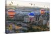 Turkey, Anatolia, Cappadocia, Goreme. Hot air balloons above Red Valley.-Emily Wilson-Stretched Canvas