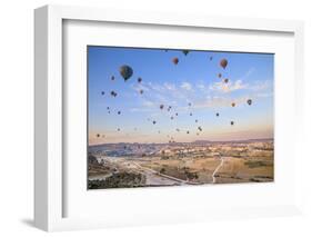 Turkey, Anatolia, Cappadocia, Goreme. Hot air balloons above Red Valley.-Emily Wilson-Framed Photographic Print