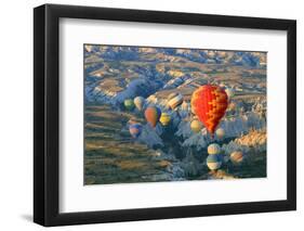 Turkey, Anatolia, Cappadocia, Goreme. Hot air balloons above Red Valley.-Emily Wilson-Framed Photographic Print