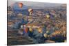 Turkey, Anatolia, Cappadocia, Goreme. Hot air balloons above Red Valley.-Emily Wilson-Stretched Canvas