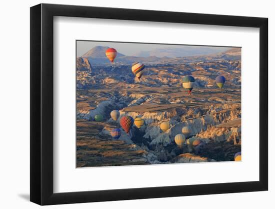 Turkey, Anatolia, Cappadocia, Goreme. Hot air balloons above Red Valley.-Emily Wilson-Framed Photographic Print