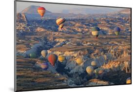 Turkey, Anatolia, Cappadocia, Goreme. Hot air balloons above Red Valley.-Emily Wilson-Mounted Photographic Print