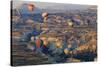 Turkey, Anatolia, Cappadocia, Goreme. Hot air balloons above Red Valley.-Emily Wilson-Stretched Canvas