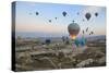 Turkey, Anatolia, Cappadocia, Goreme. Hot air balloons above Red Valley.-Emily Wilson-Stretched Canvas