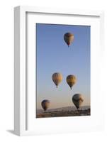 Turkey, Anatolia, Cappadocia, Goreme. Hot air balloons above Red Valley.-Emily Wilson-Framed Photographic Print