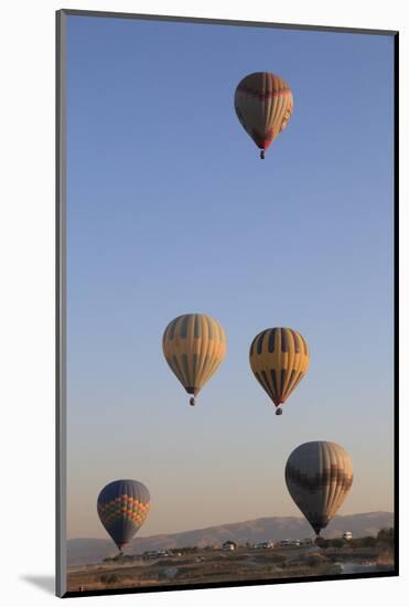 Turkey, Anatolia, Cappadocia, Goreme. Hot air balloons above Red Valley.-Emily Wilson-Mounted Photographic Print