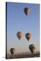 Turkey, Anatolia, Cappadocia, Goreme. Hot air balloons above Red Valley.-Emily Wilson-Stretched Canvas