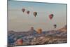Turkey, Anatolia, Cappadocia, Goreme. Hot air balloons flying above the valley.-Emily Wilson-Mounted Photographic Print