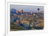 Turkey, Anatolia, Cappadocia, Goreme. Hot air balloons flying above the valley.-Emily Wilson-Framed Premium Photographic Print