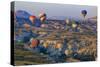 Turkey, Anatolia, Cappadocia, Goreme. Hot air balloons flying above the valley.-Emily Wilson-Stretched Canvas