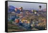 Turkey, Anatolia, Cappadocia, Goreme. Hot air balloons flying above the valley.-Emily Wilson-Framed Stretched Canvas