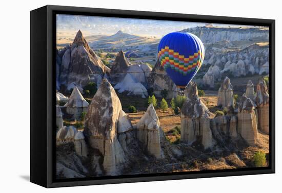 Turkey, Anatolia, Cappadocia, Goreme. Hot air balloons flying above the valley.-Emily Wilson-Framed Stretched Canvas