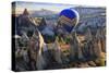 Turkey, Anatolia, Cappadocia, Goreme. Hot air balloons flying above the valley.-Emily Wilson-Stretched Canvas