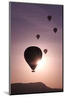 Turkey, Anatolia, Cappadocia, Goreme. Hot air balloons flying above the valley.-Emily Wilson-Mounted Photographic Print