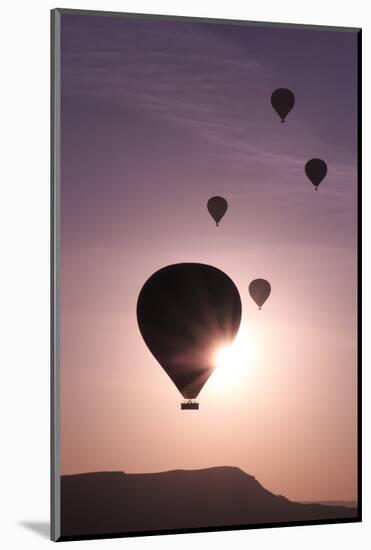 Turkey, Anatolia, Cappadocia, Goreme. Hot air balloons flying above the valley.-Emily Wilson-Mounted Photographic Print